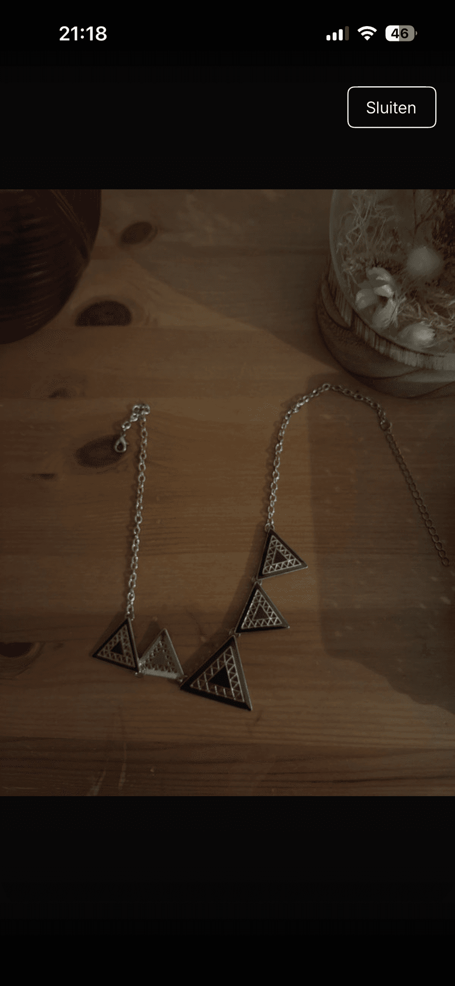 Zilveren ketting met driehoekige hangers