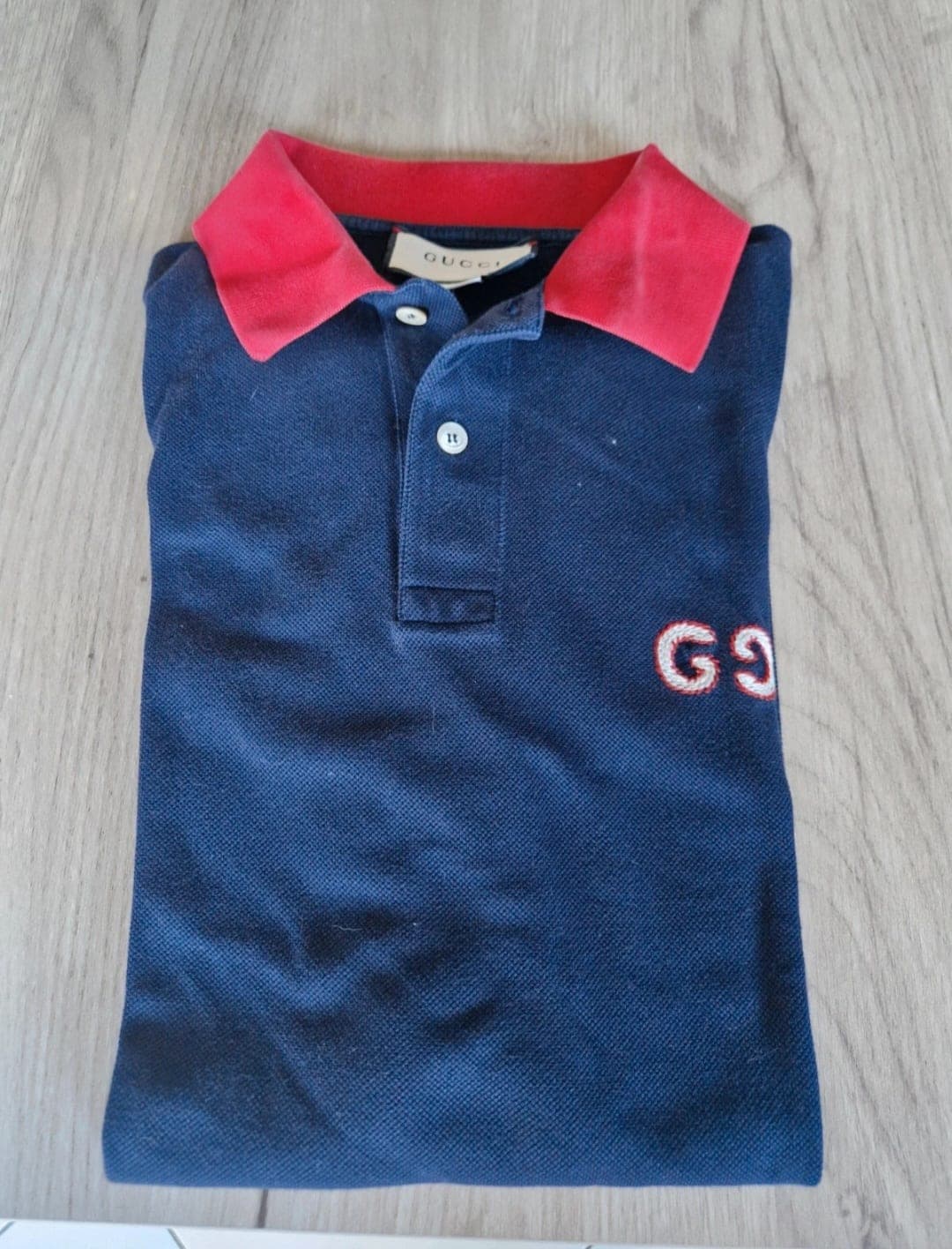 Gucci polo shirt with pink collar and GG logo