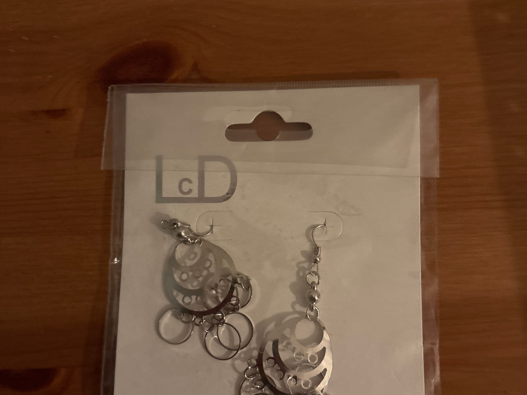 cD zilveren oorbellen met ringen en steentjes