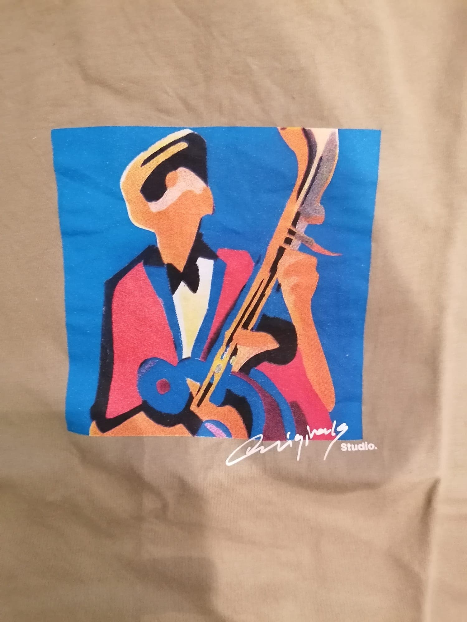 Beige t-shirt met vintage muzikant print